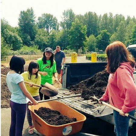 people work in a garden