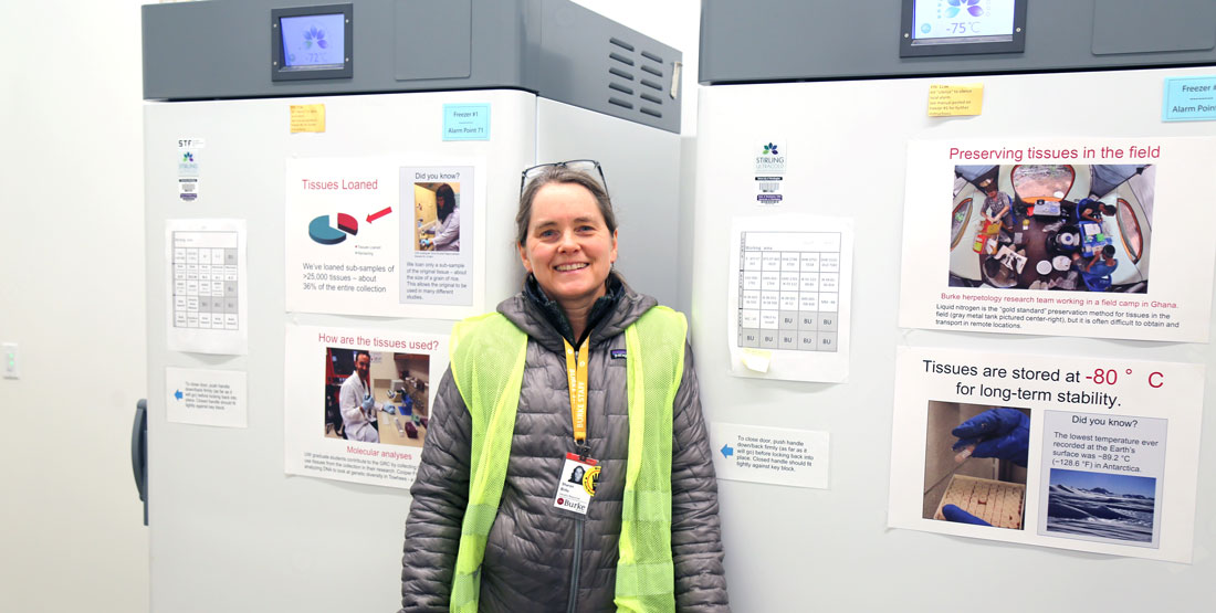 a woman stands next to the first two freezers moved in