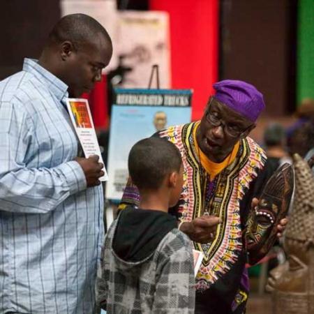 people interact with The Unspoken Truths traveling museum